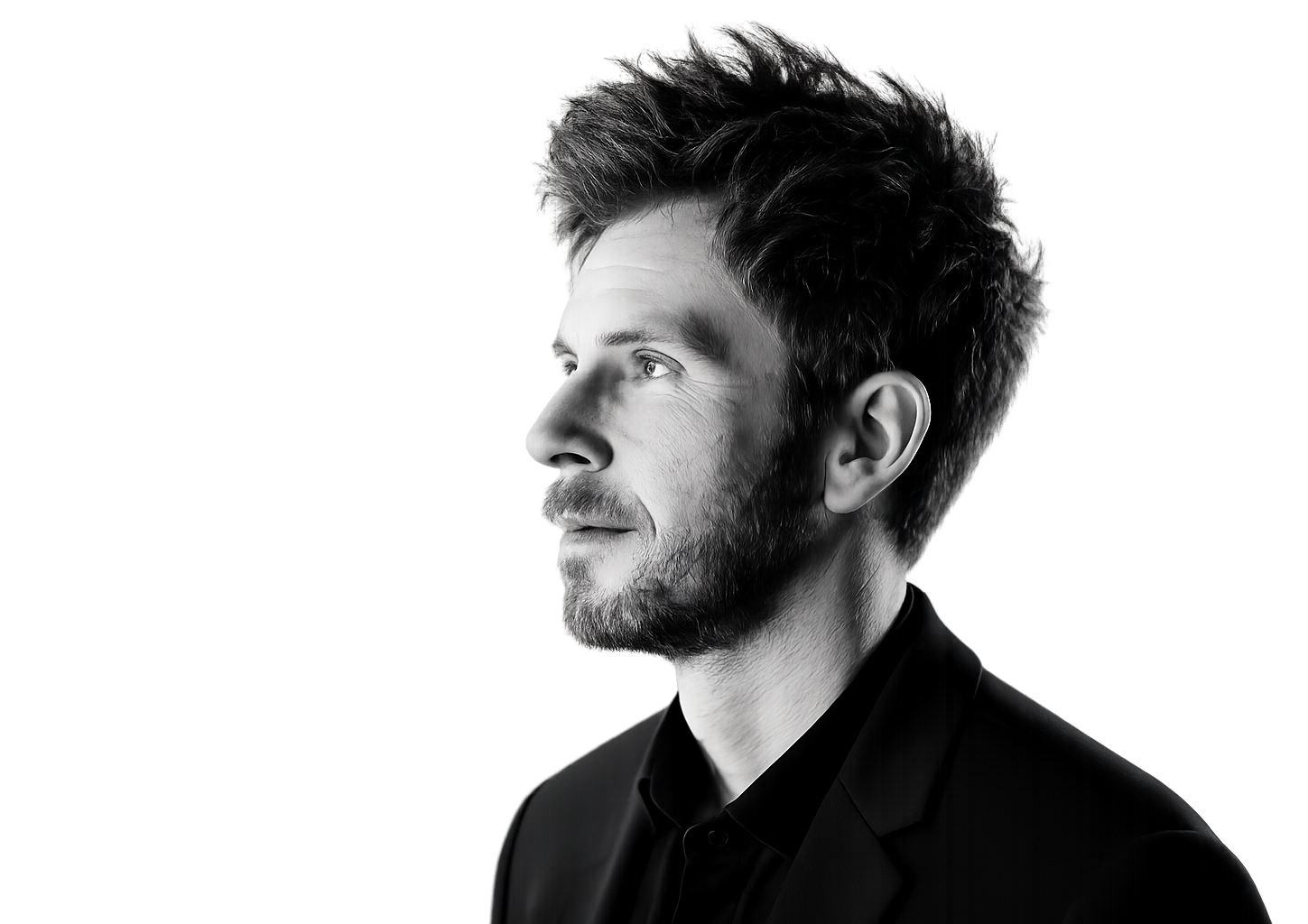 Black and white profile portrait of Tyler Lidster